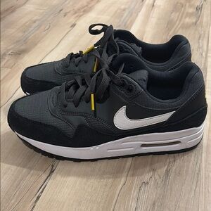 Black and White Sneakers with Yellow Accents